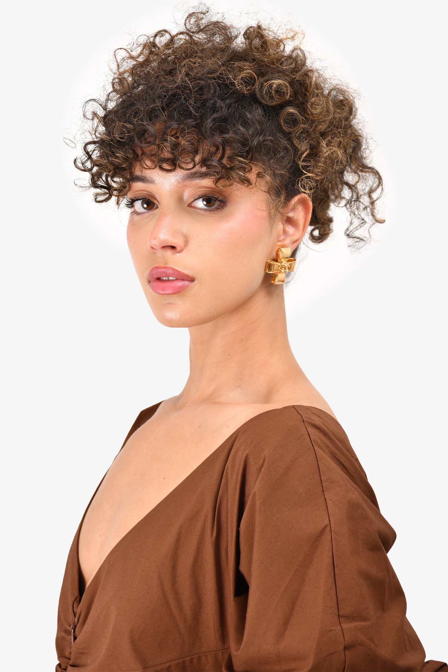 Chanel™ 97A Gold Tone Coco Mark Cross Ribbon Clip-on Earrings