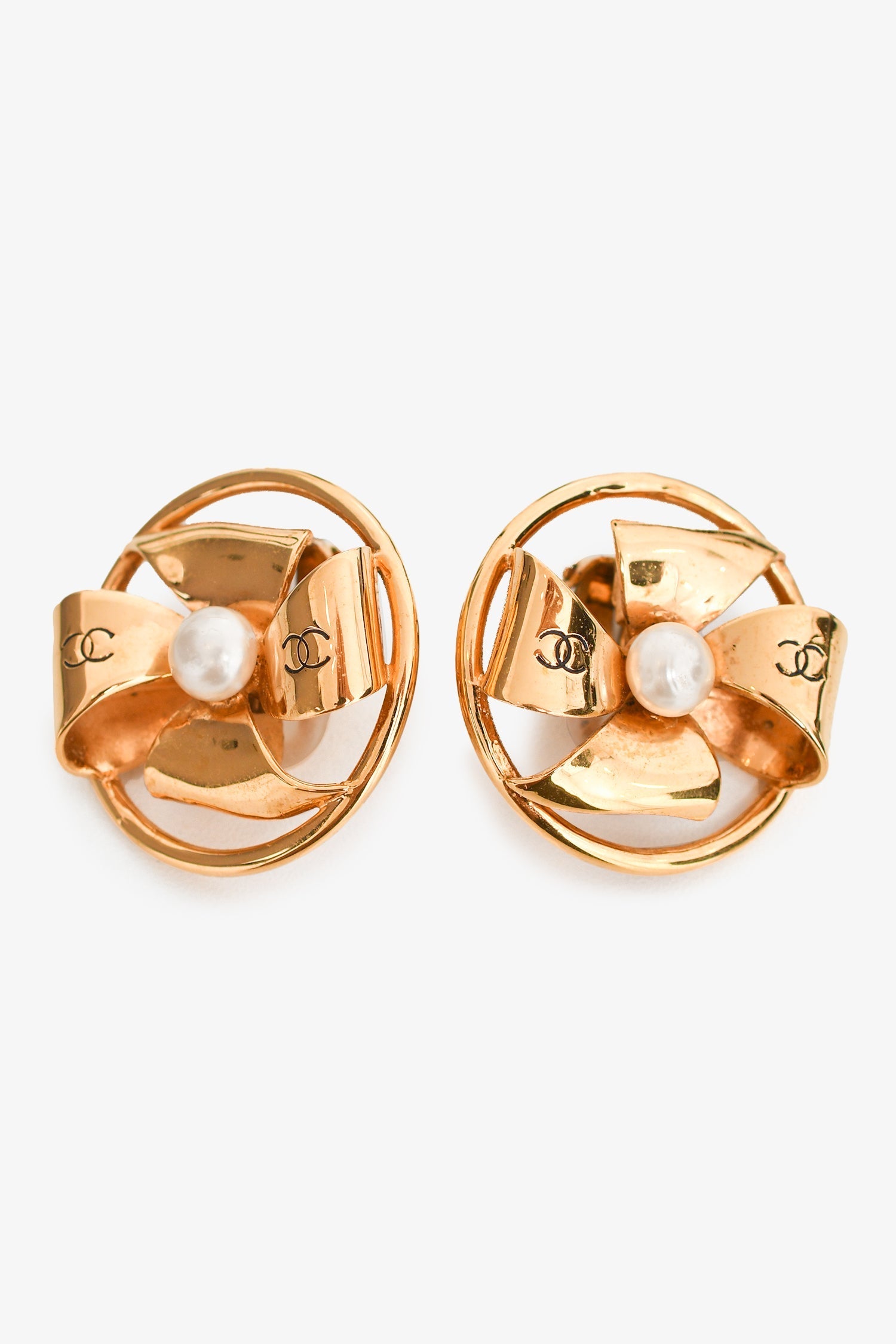 Chanel™ Gold Tone CC Pinwheel Pearl Clip-On Earrings