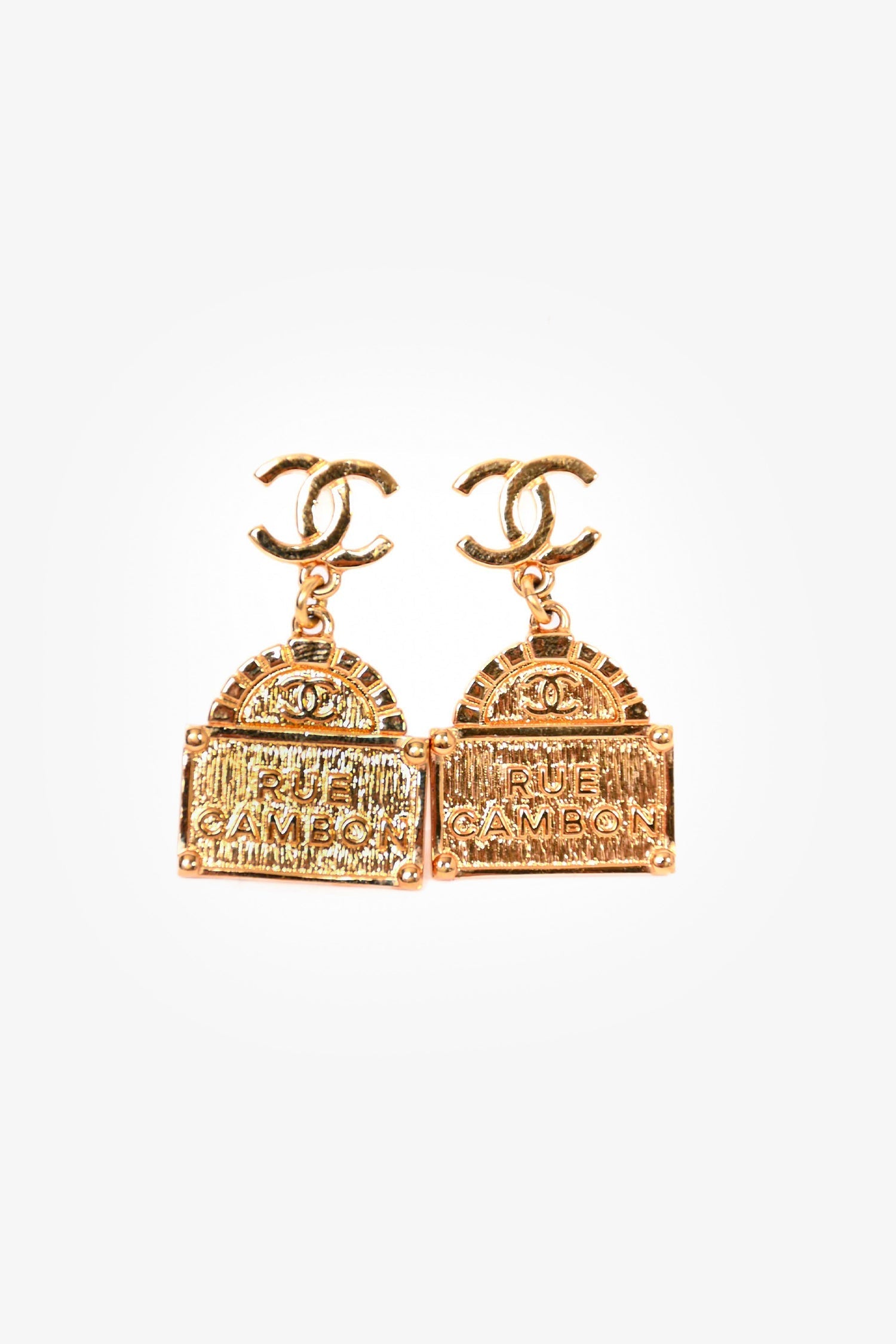 Chanel™ 2022 Gold Toned CC 'Rue Cambon' Drop Stud Earrings