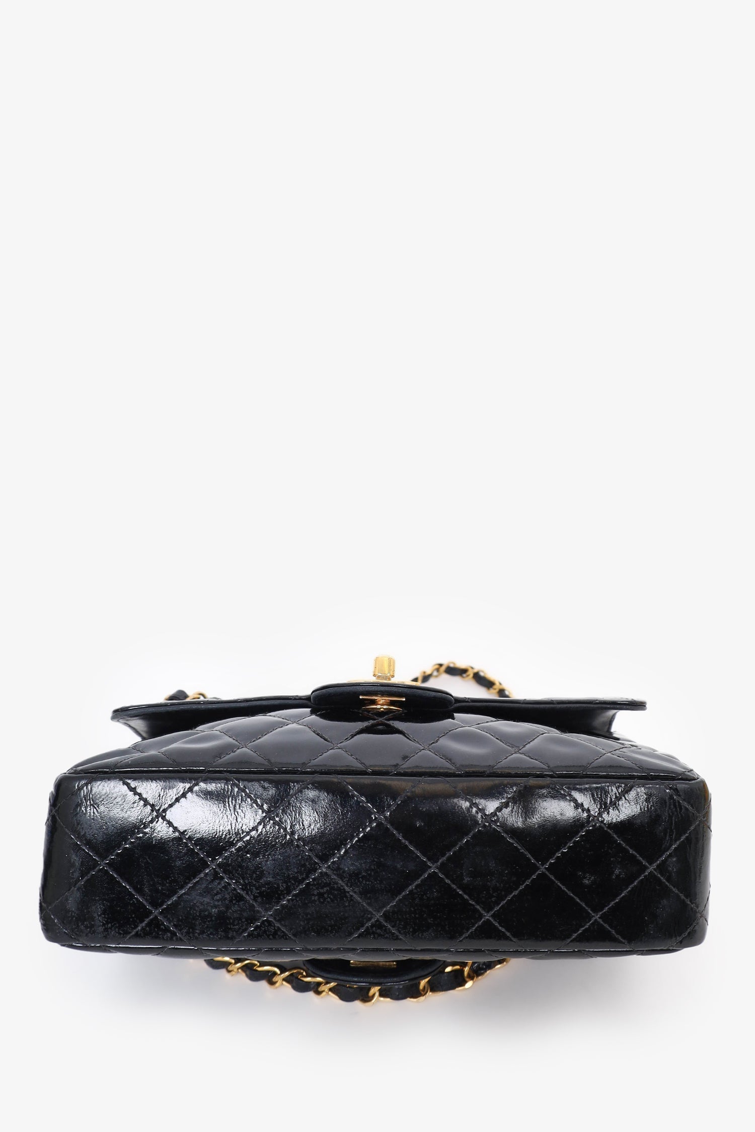 Chanel™ 1996-97 Black Quilted Patent Double Sided Flap Bag