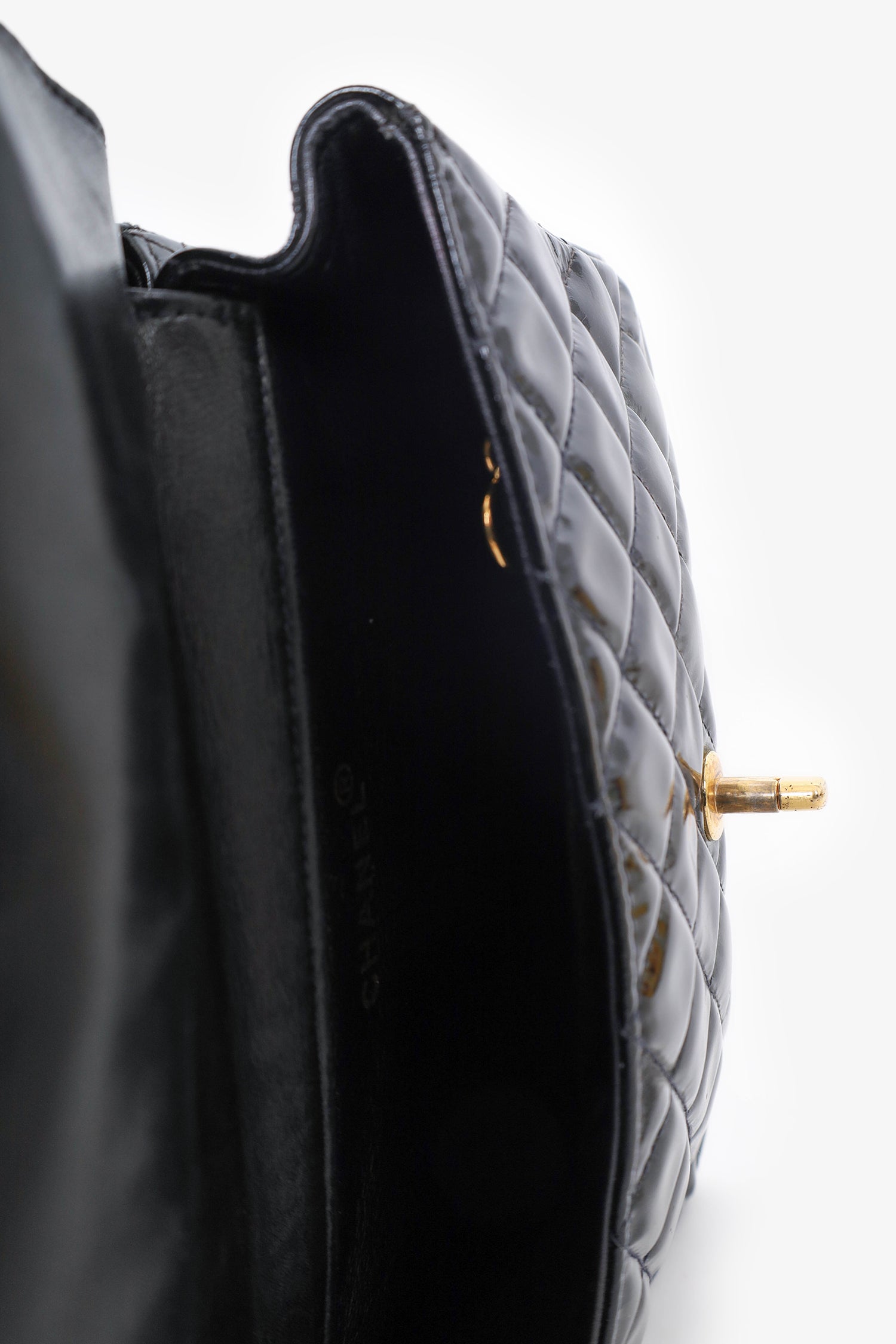 Chanel™ 1996-97 Black Quilted Patent Double Sided Flap Bag