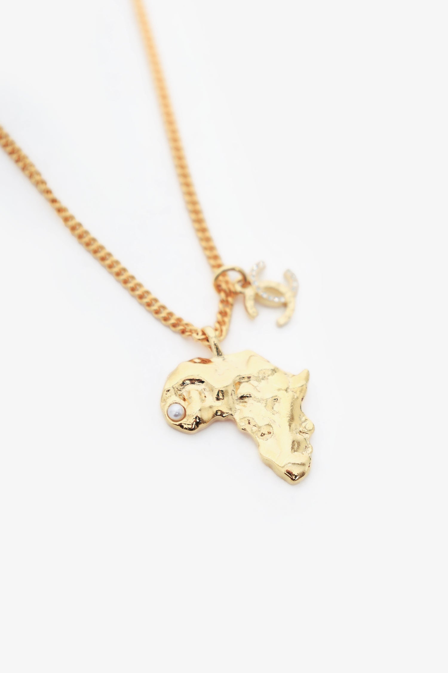 Chanel™ Gold Tone Africa Map Pendant Necklace
