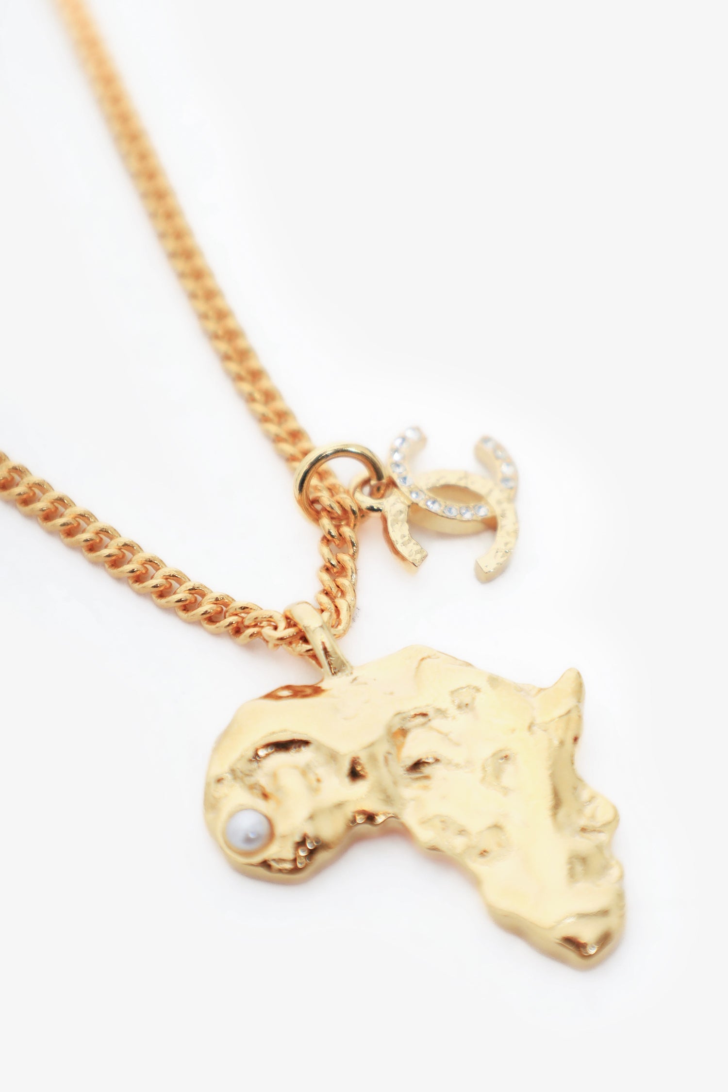 Chanel™ Gold Tone Africa Map Pendant Necklace