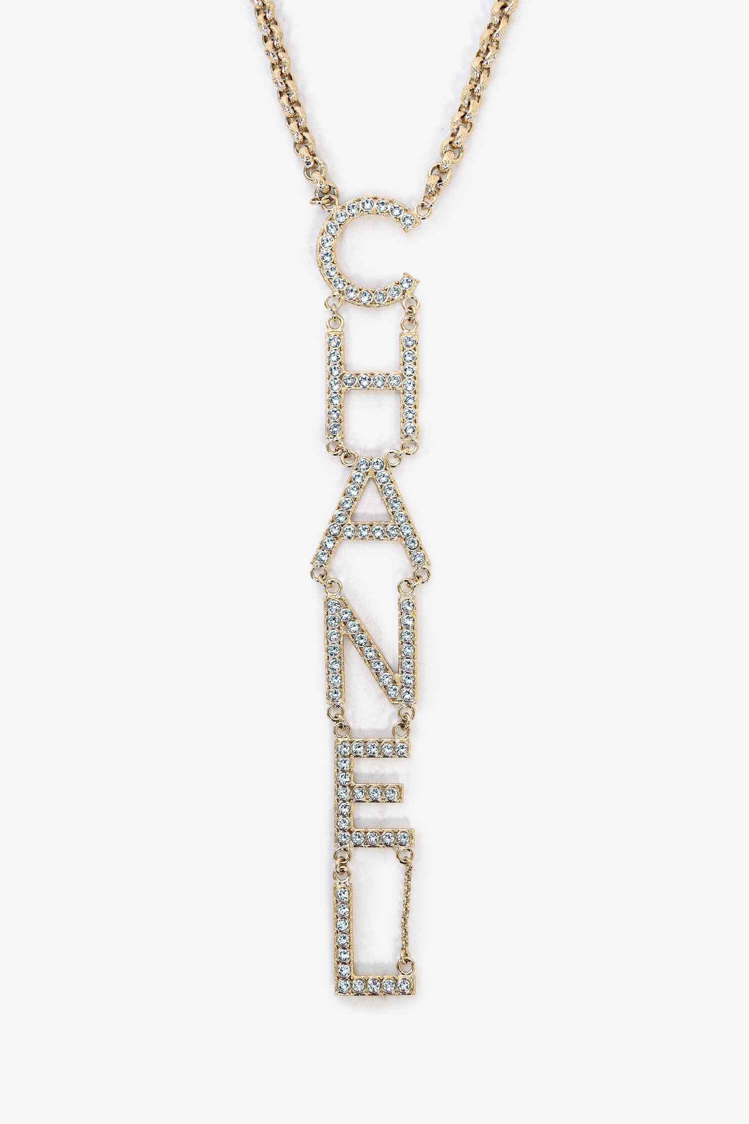 Chanel™ Runway SS2019 Gold Toned Crystal Embellished Large 'CHANEL' Vertical Drop Necklace