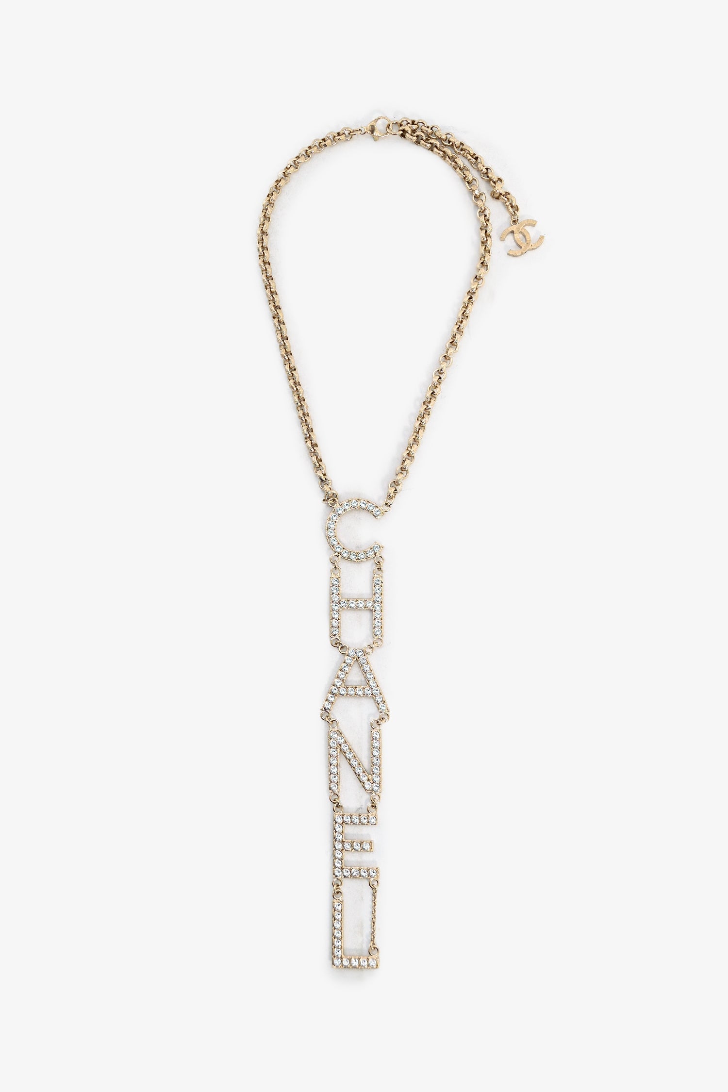 Chanel™ Runway SS2019 Gold Toned Crystal Embellished Large 'CHANEL' Vertical Drop Necklace
