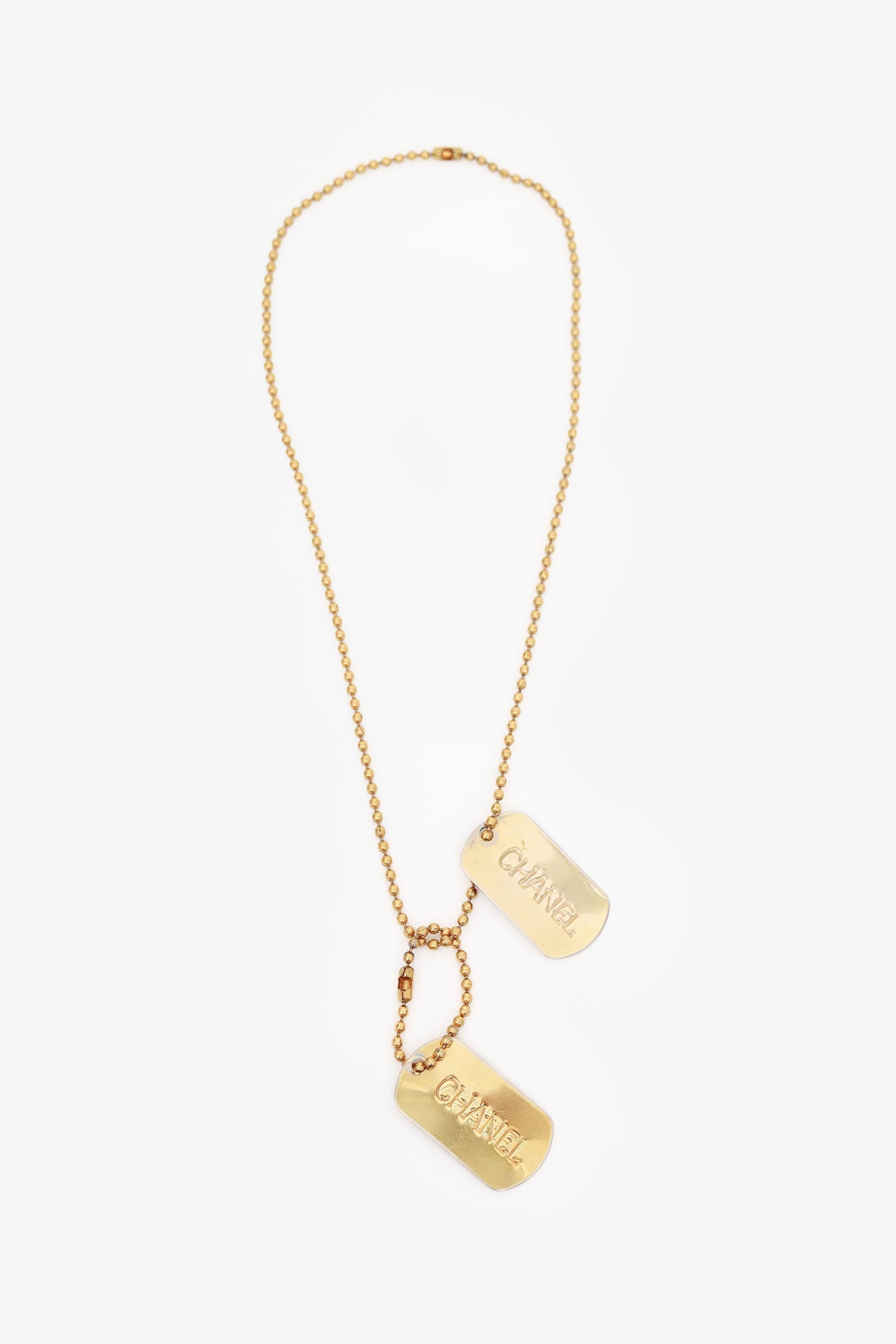 Chanel™ 93A Gold Tone Dog Tag Pendant Necklace