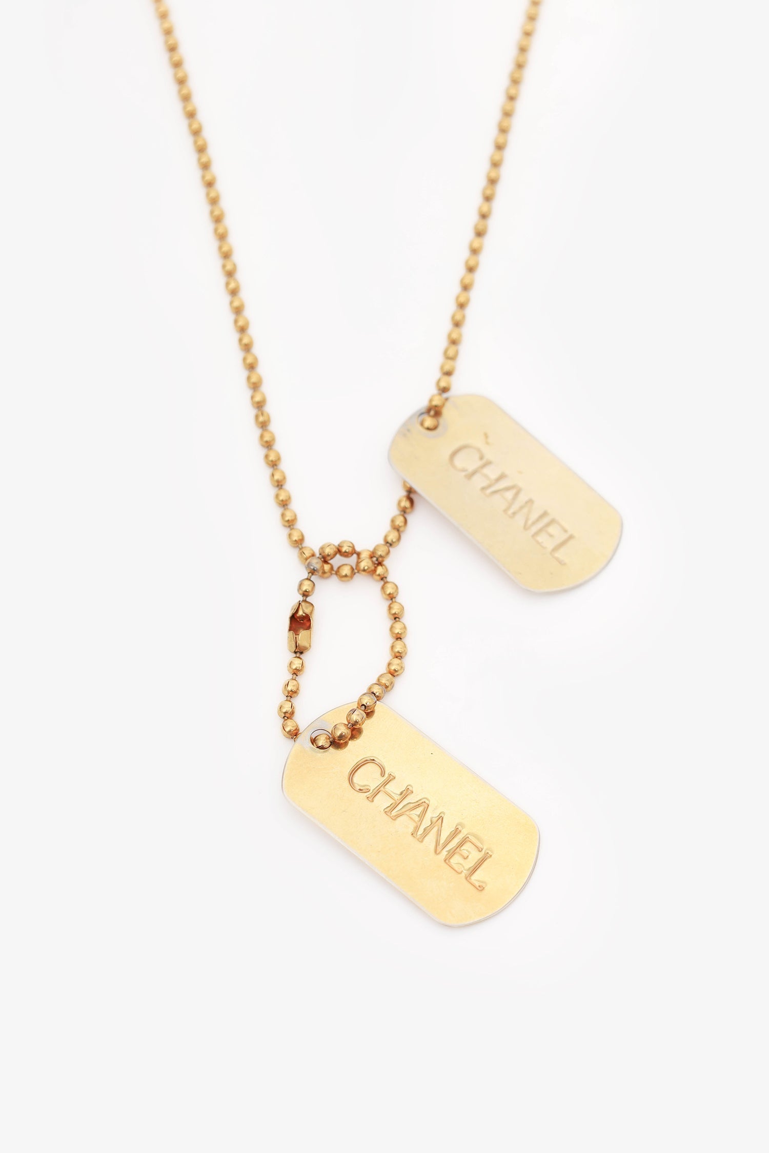 Chanel™ 93A Gold Tone Dog Tag Pendant Necklace