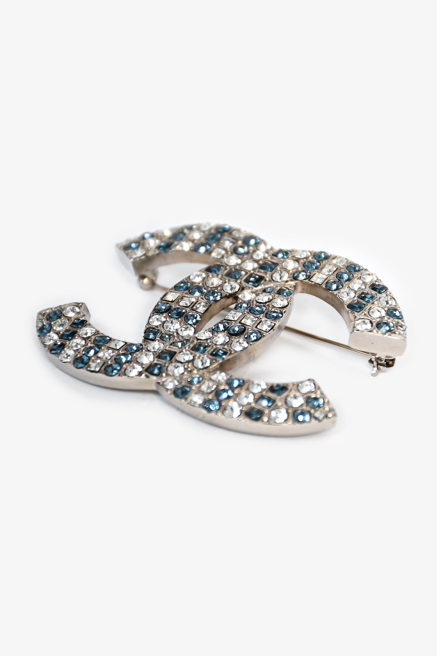 Chanel™ 2019 Silver Toned Blue Crystal Embellished CC Brooch