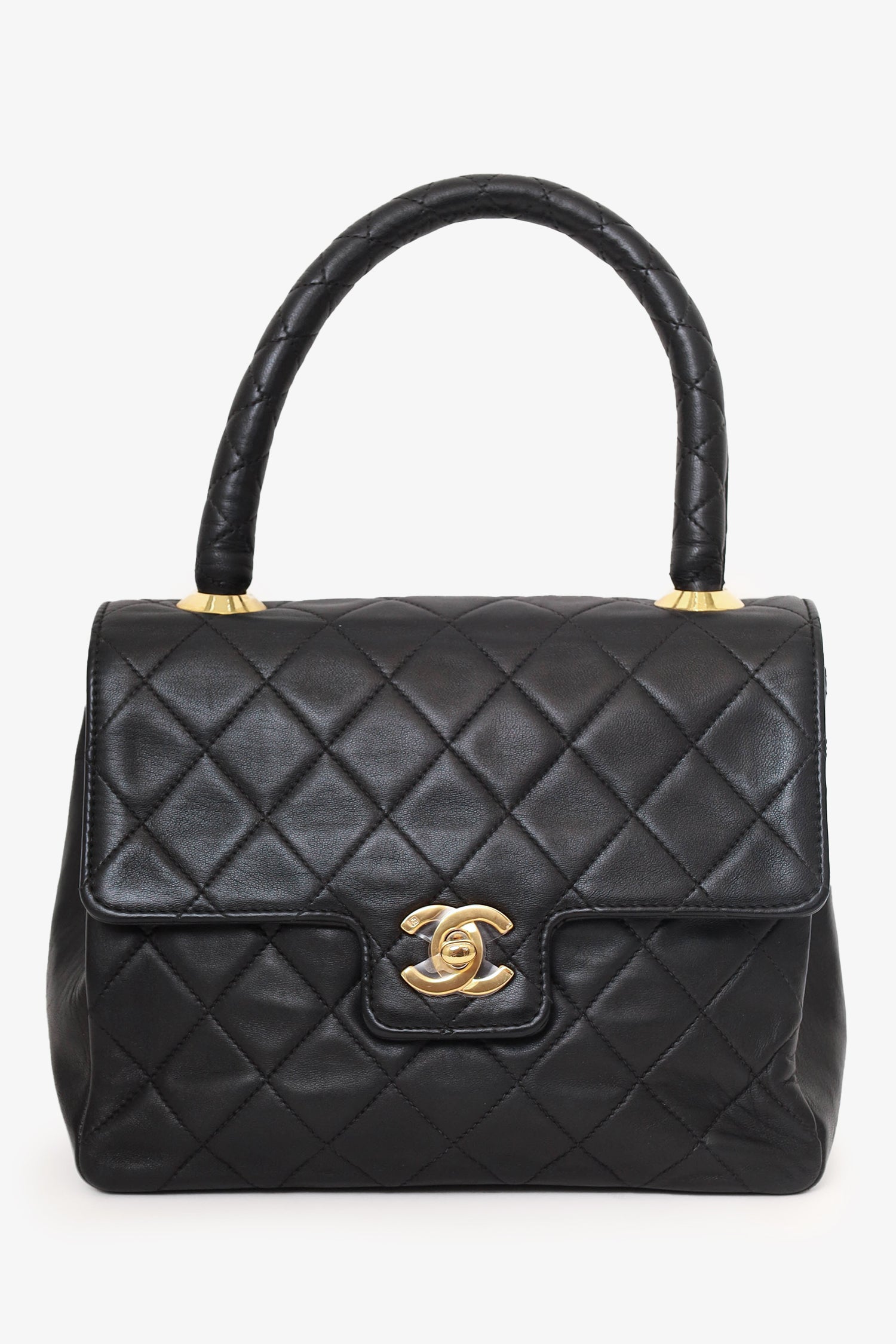 Chanel™ 1991-94 Black Quilted Lambskin Kelly Top Handle Bag