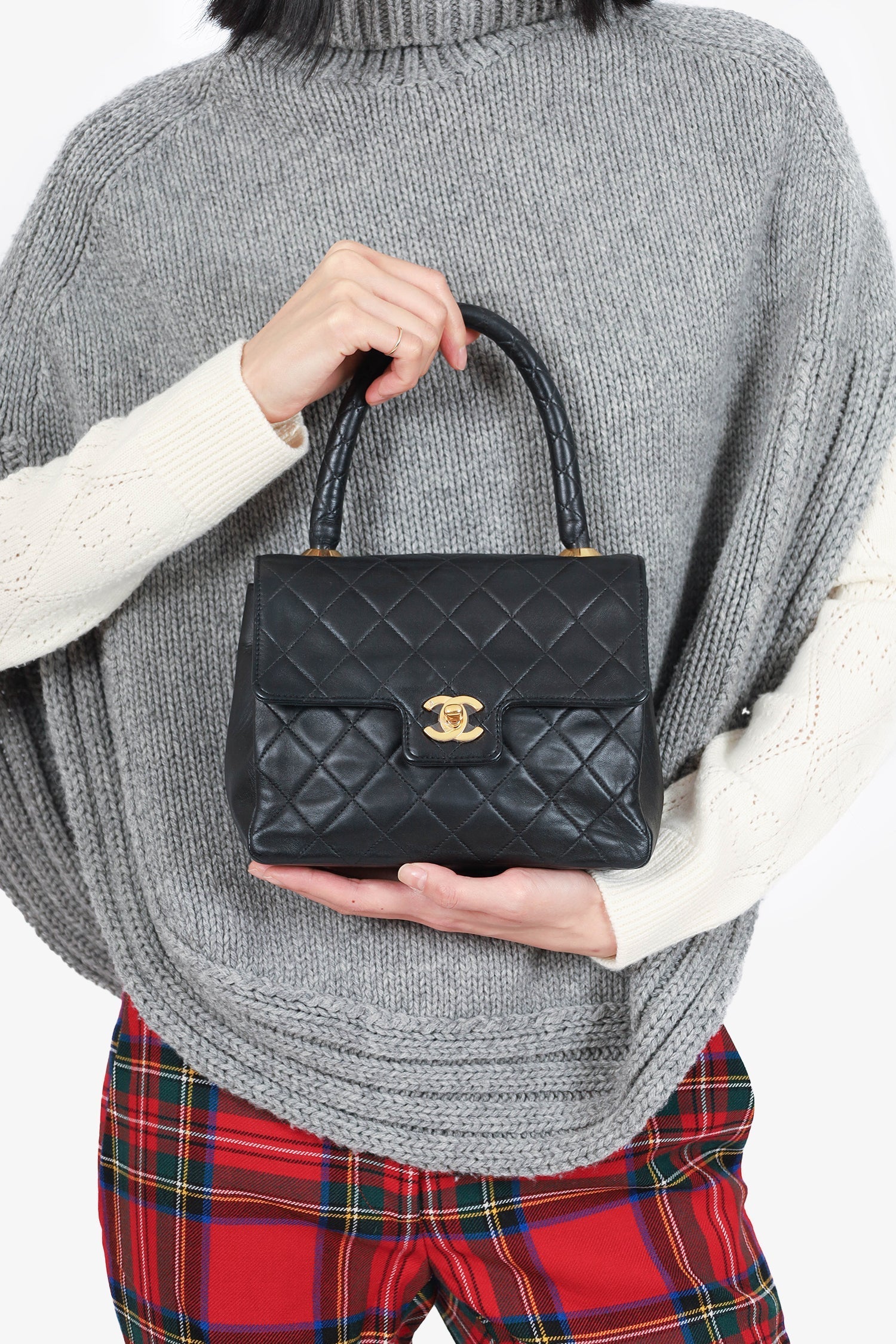 Chanel™ 1991-94 Black Quilted Lambskin Kelly Top Handle Bag
