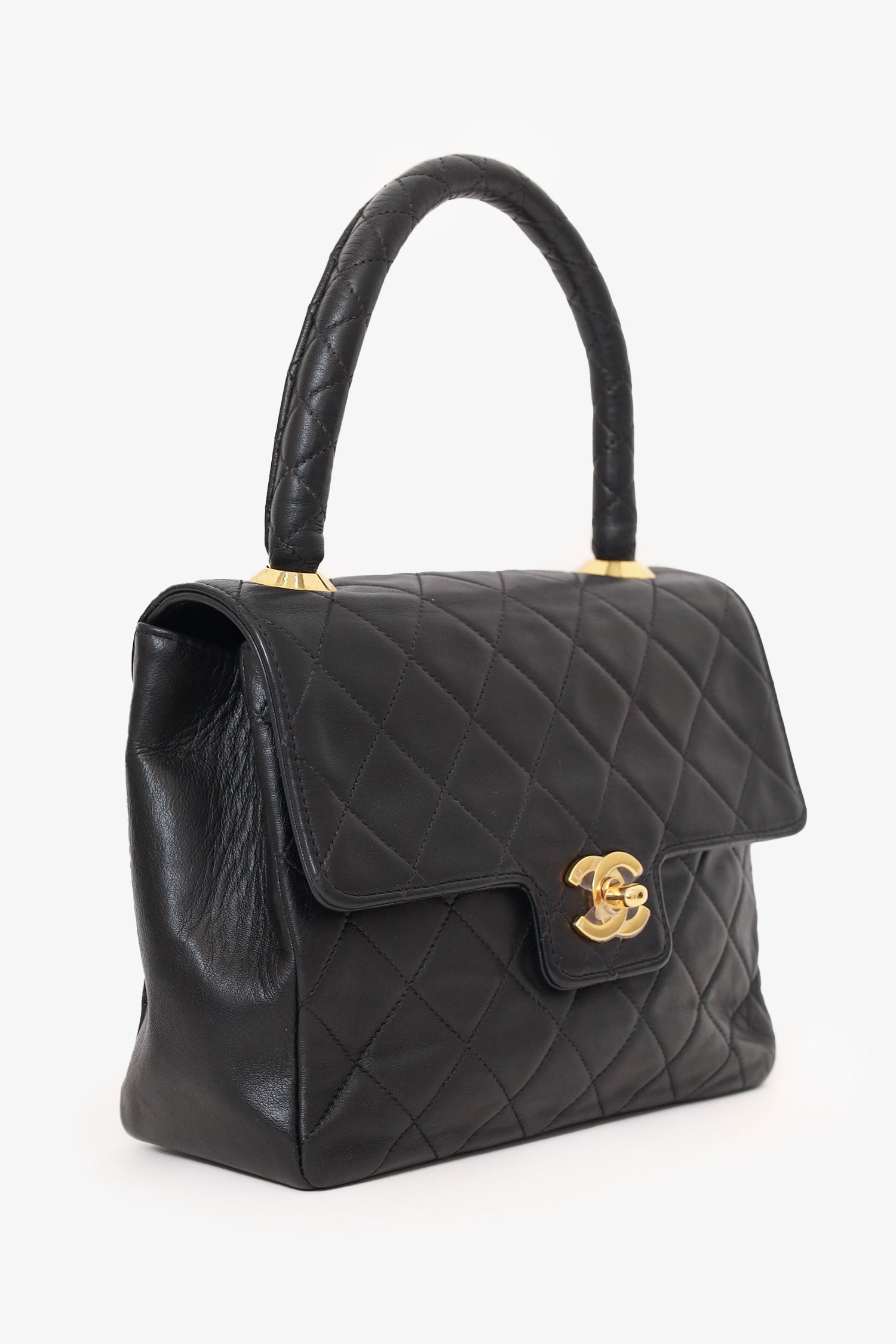Chanel™ 1991-94 Black Quilted Lambskin Kelly Top Handle Bag