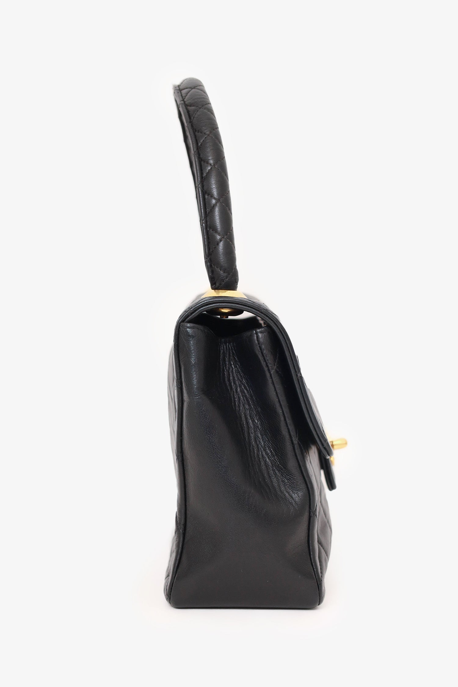 Chanel™ 1991-94 Black Quilted Lambskin Kelly Top Handle Bag