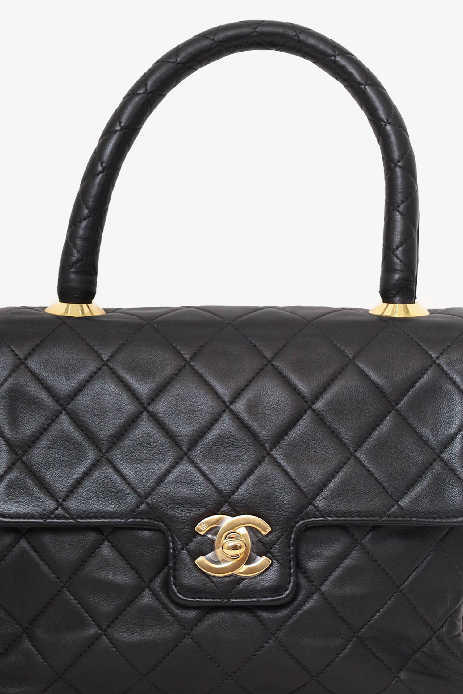 Chanel™ 1991-94 Black Quilted Lambskin Kelly Top Handle Bag