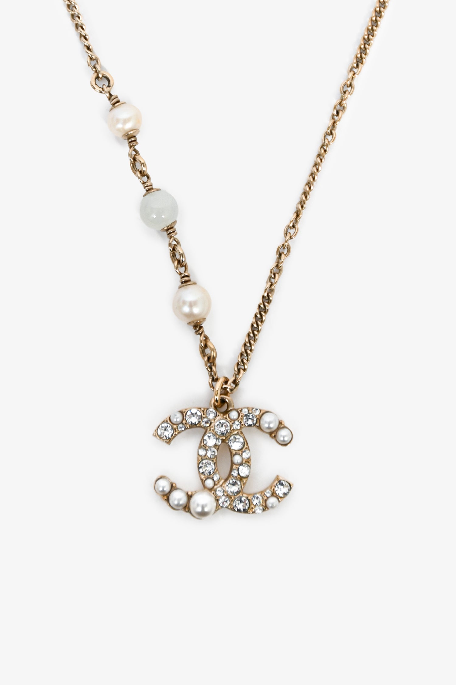 Chanel™ 2021 Gold Toned Faux Pearl Crystal Embellished CC Pendant Necklace