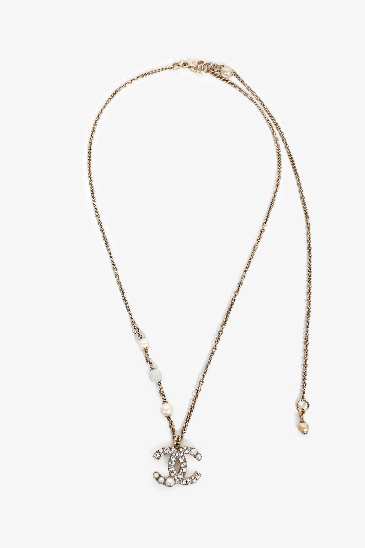 Chanel™ 2021 Gold Toned Faux Pearl Crystal Embellished CC Pendant Necklace