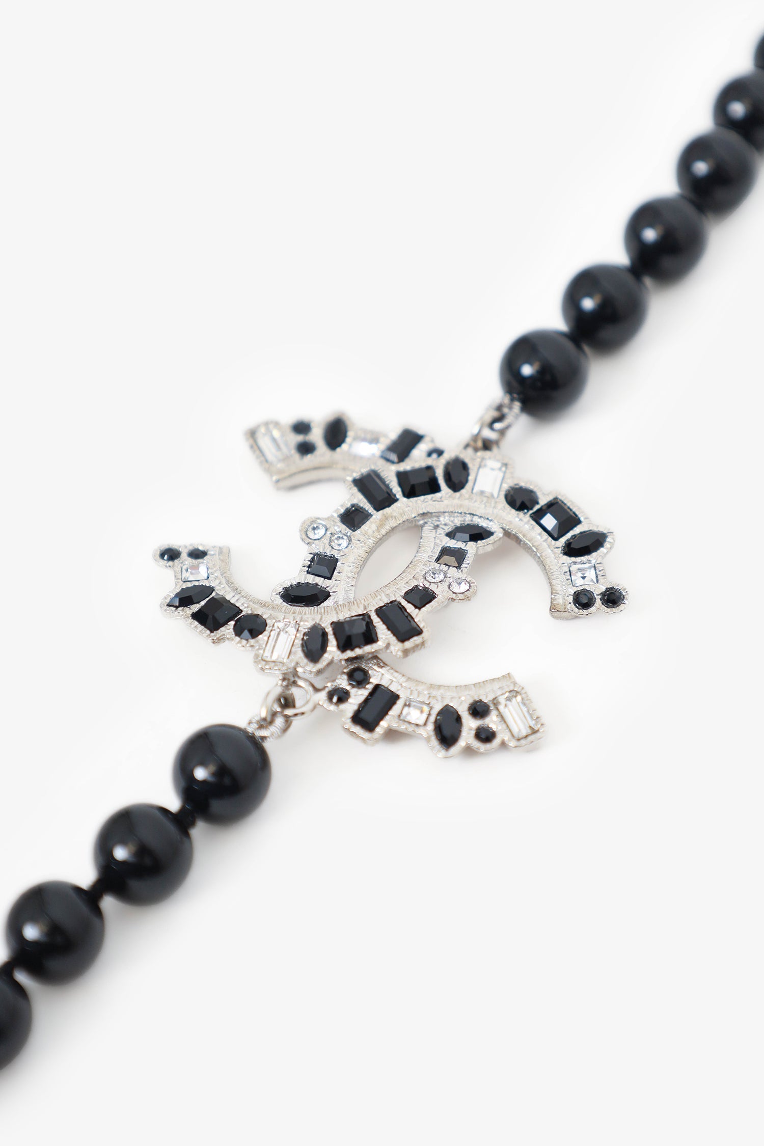 Chanel™ 16K Black Faux Pearls and Crystal Embellished Metal CC Long Necklace