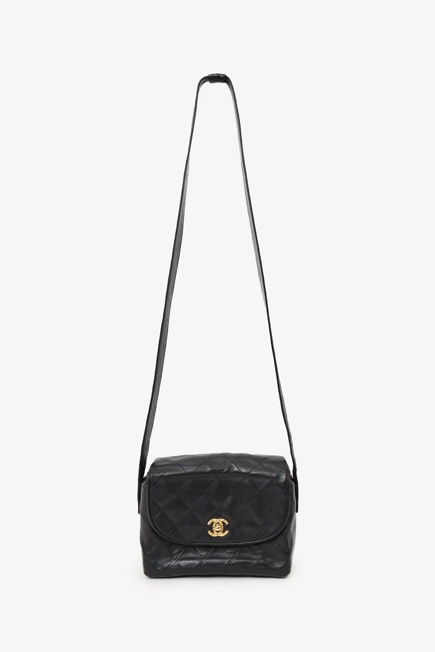Chanel™ 1991-94 Black Lambskin Round Flap Shoulder Bag