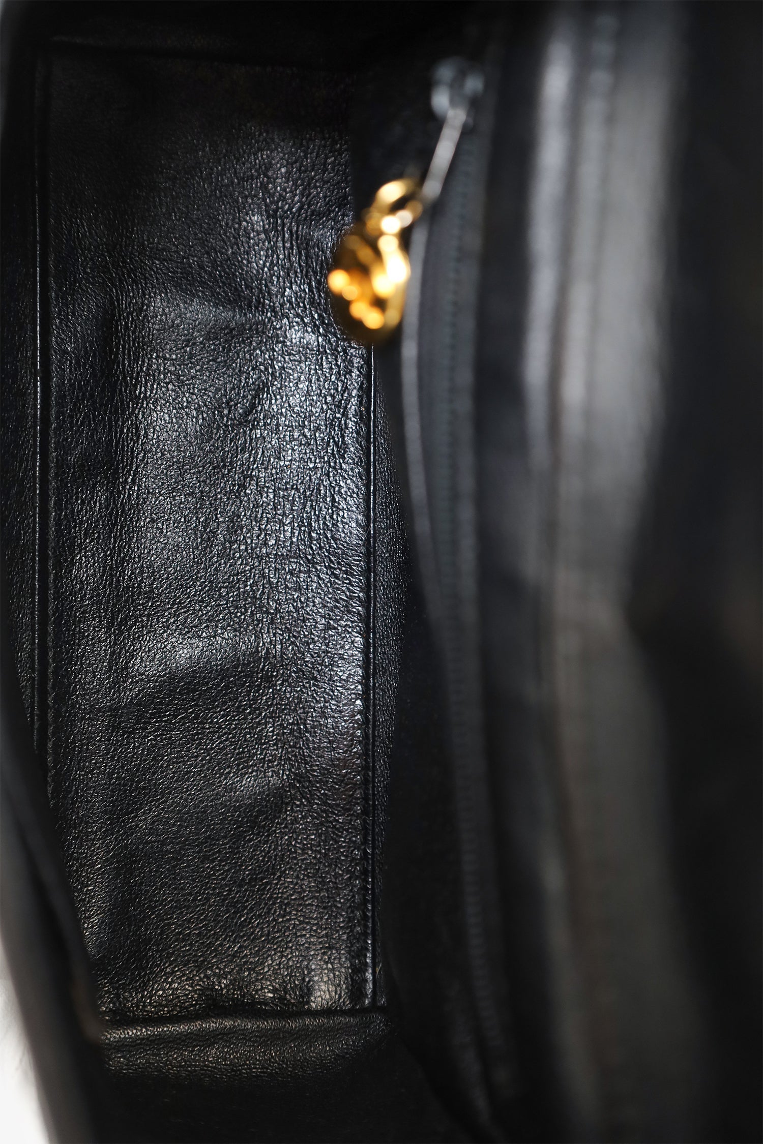 Chanel™ 1991-94 Black Lambskin Round Flap Shoulder Bag