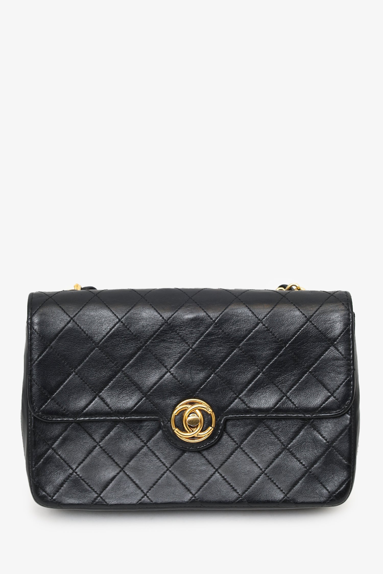 Chanel™ 1986-88 Black Quilted Lambskin Circle CC Mini Flap Bag