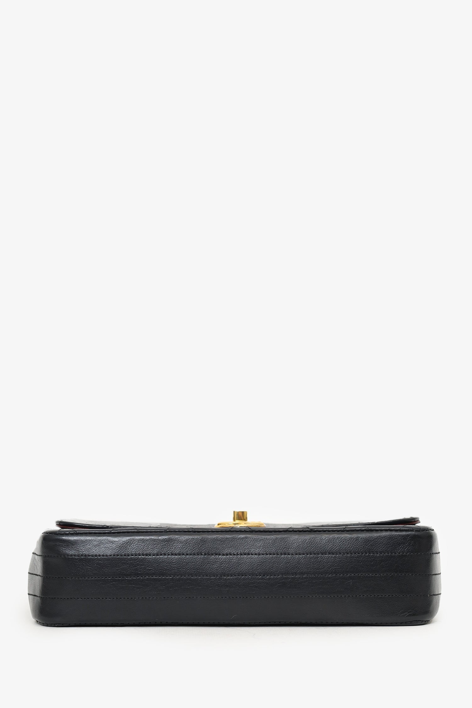 Chanel™ 1986-88 Black Quilted Lambskin Circle CC Mini Flap Bag