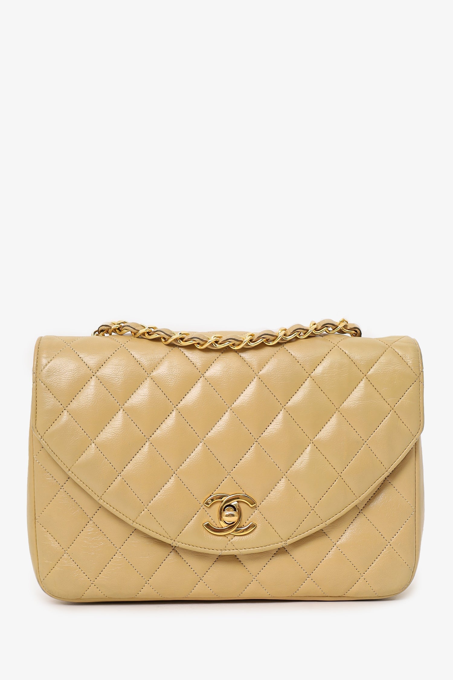 Chanel™ 1986-88 Beige Quilted Lambskin Half Moon Flap Bag
