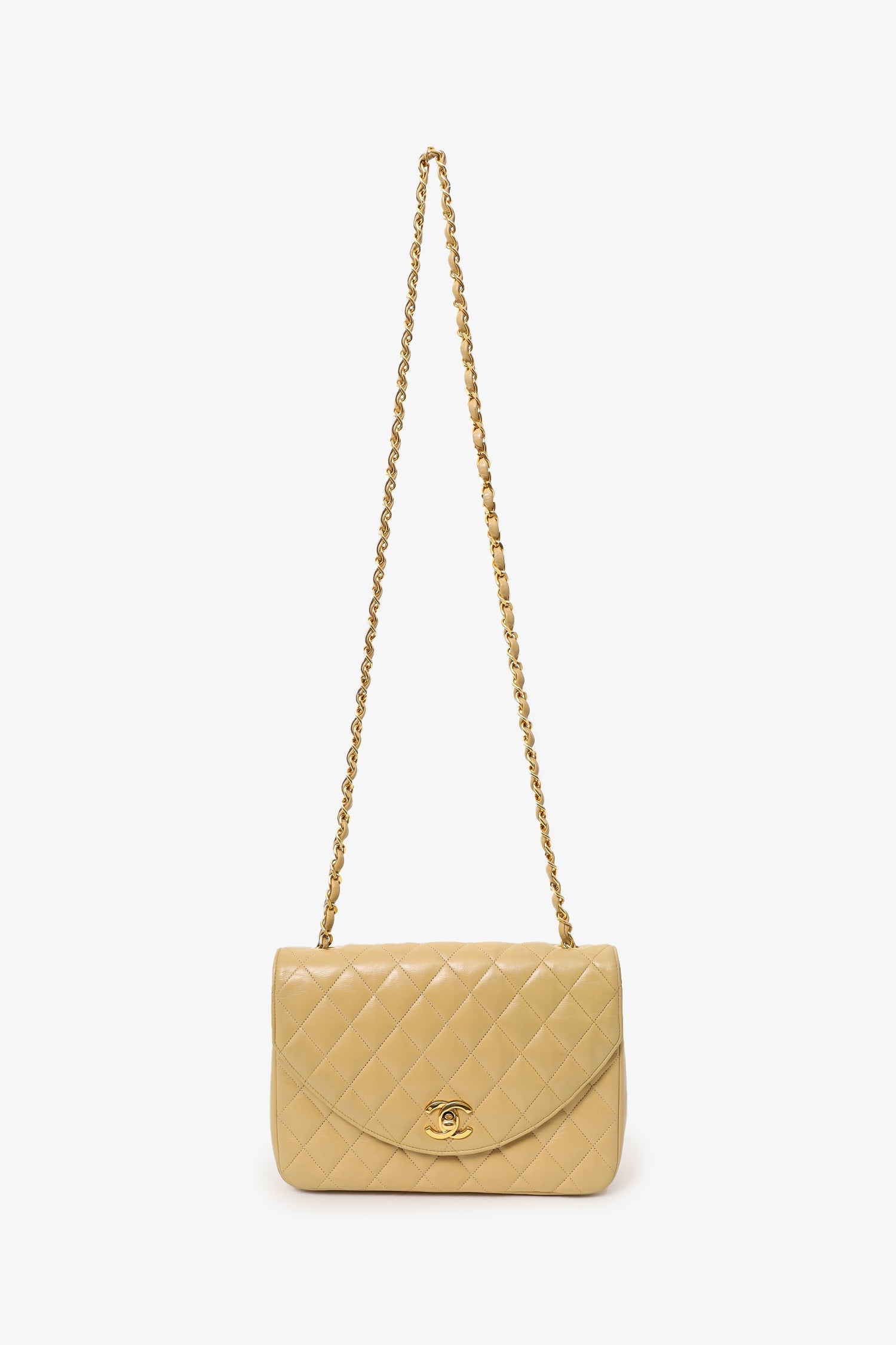 Chanel™ 1986-88 Beige Quilted Lambskin Half Moon Flap Bag