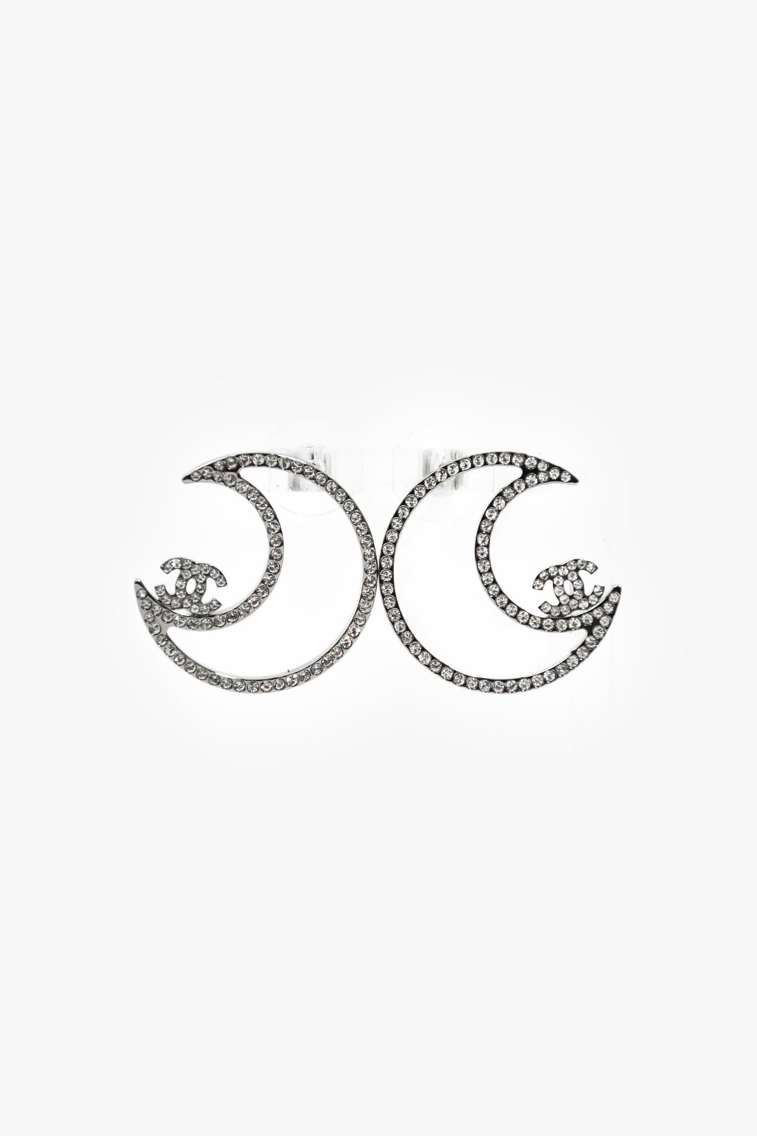 Chanel™ 2017 Silver Toned Crystal CC Moon Stud Earrings