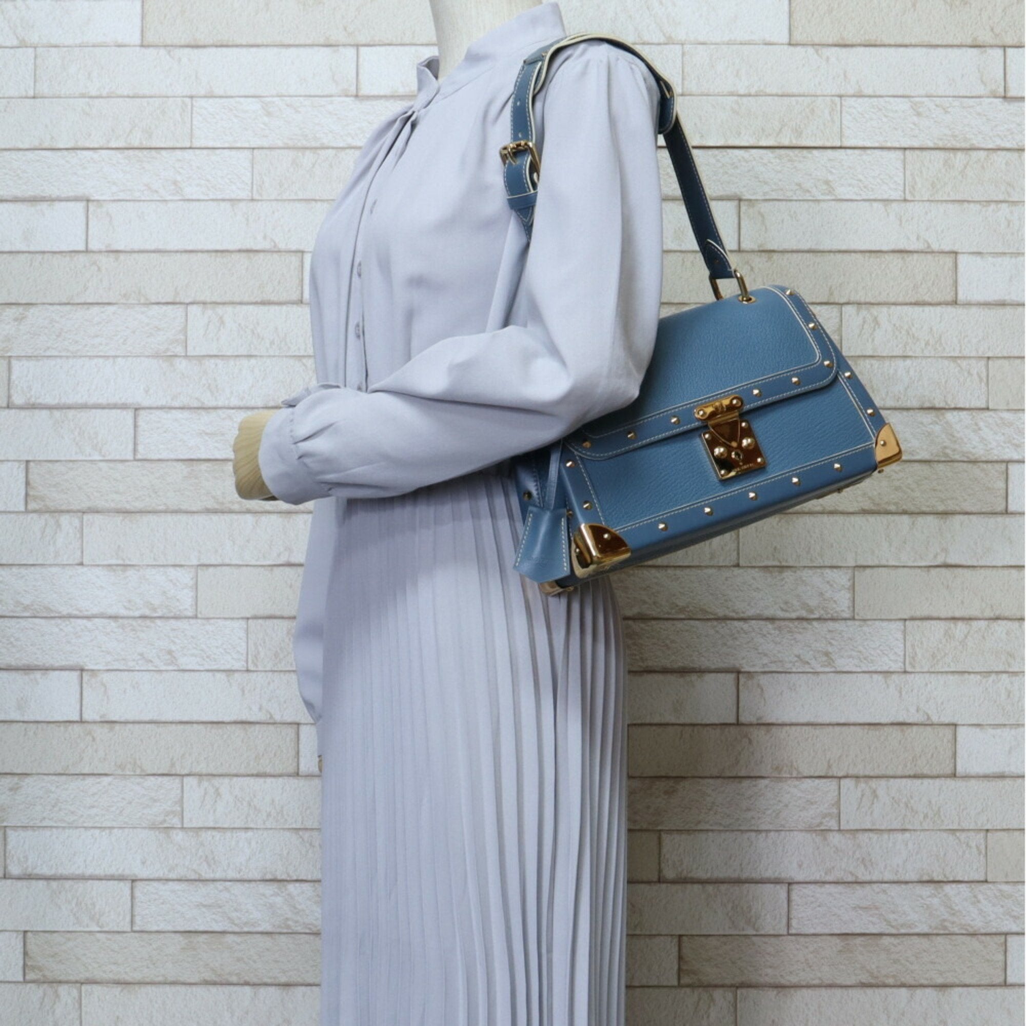 Louis Vuitton Talentueux Leather Shoulder Bag ()